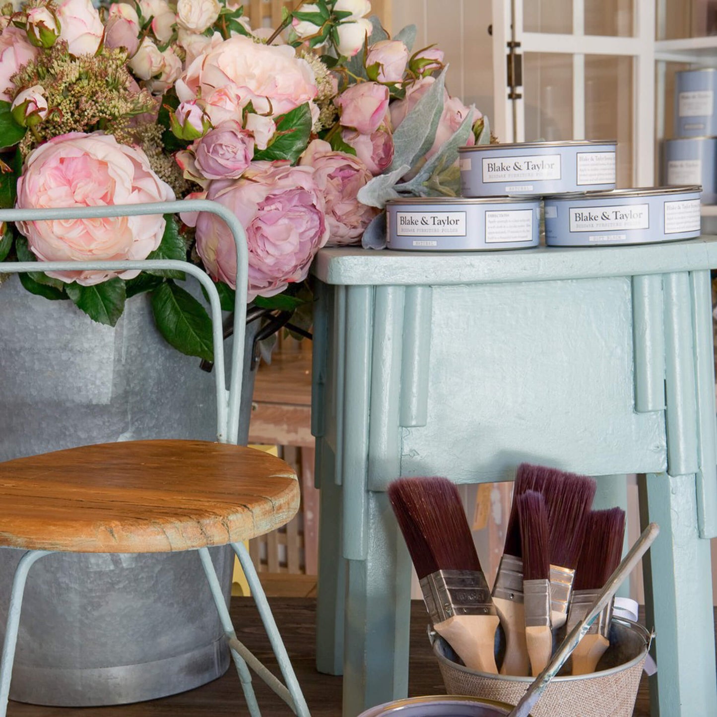 Small table and metal chair painted with Blake & Taylor Duck Chalk Furniture Paint
