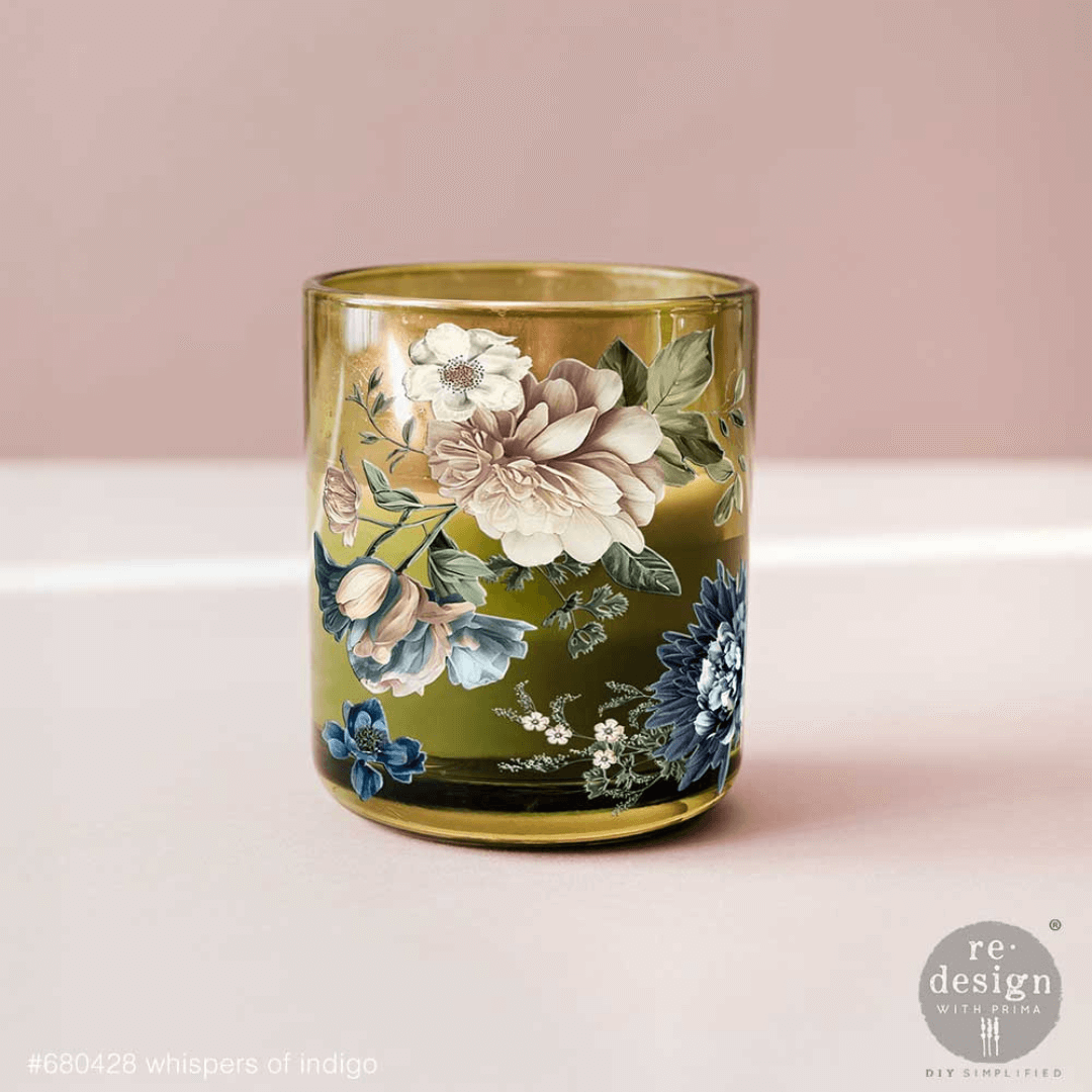 Decorative glass with floral design on a pink background